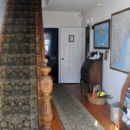 Candlebay Inn entrance with antique banister