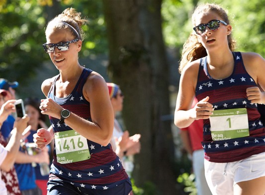 Two women participate in the annual L.L. Bean 10k and 1k Fun Run/Walk in Freeport, Maine.